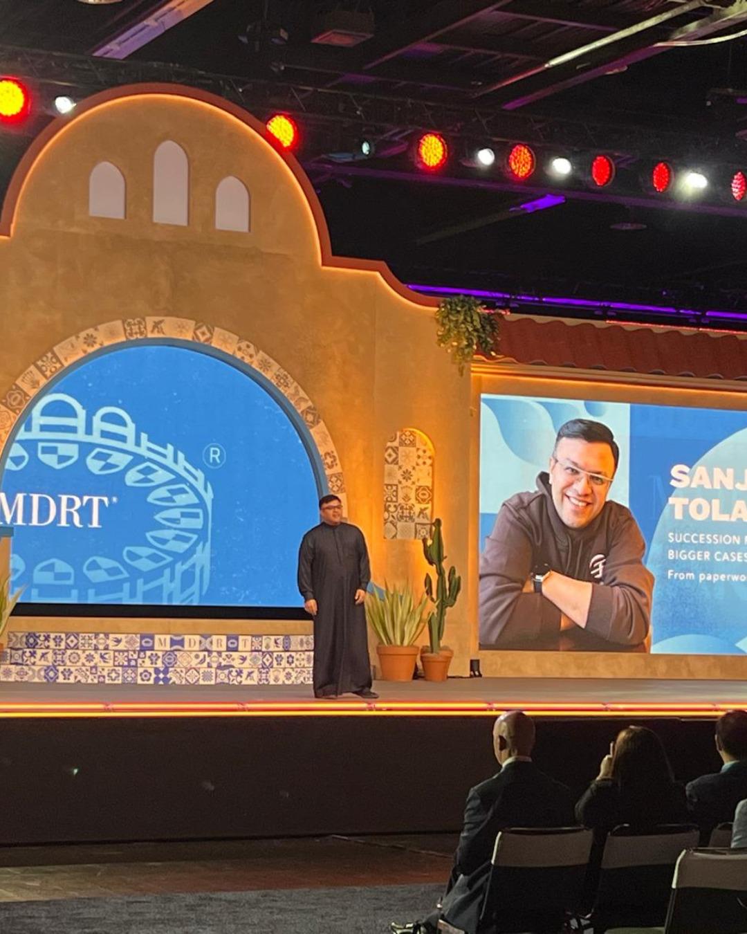 Dr. Sanjay Tolani presenting to an MDRT audience